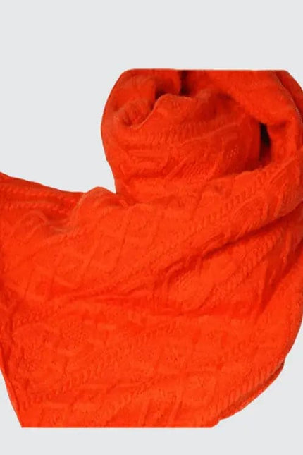 Italian cashmere scarf with intricate cable pattern in bright orange color
