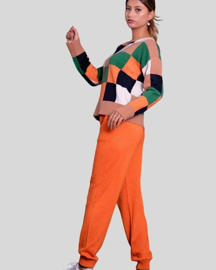 Eye-catching multi-color crew neck intarsia sweater worn by woman in orange and green outfit | Intarsia Sweater KCI 254