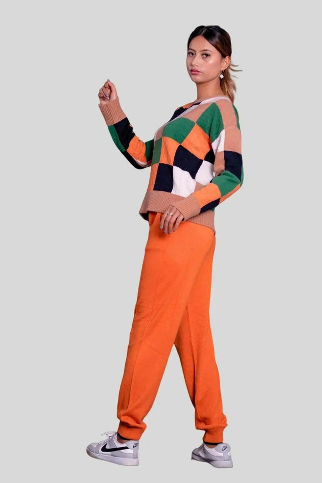 Eye-catching multi-color crew neck intarsia sweater worn by woman in orange and green outfit | Intarsia Sweater KCI 254