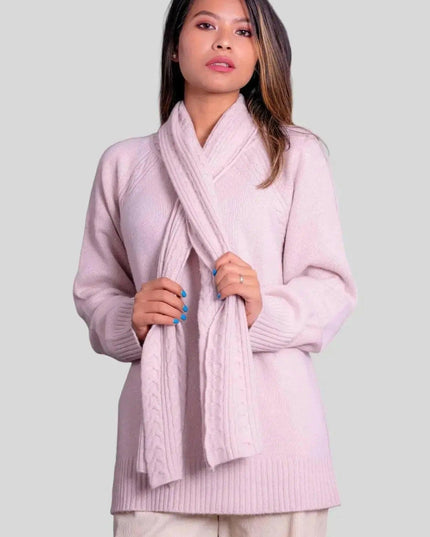 Italian Cariaggi Cashmere Pullover featuring a woman in pink sweater and white pants