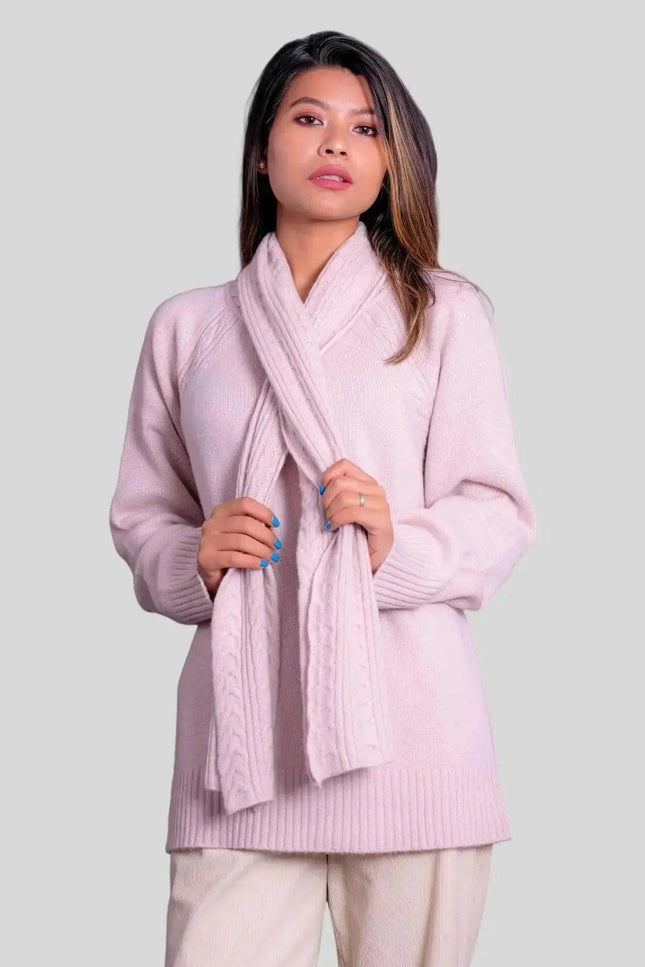 Italian Cariaggi Cashmere Pullover featuring a woman in pink sweater and white pants