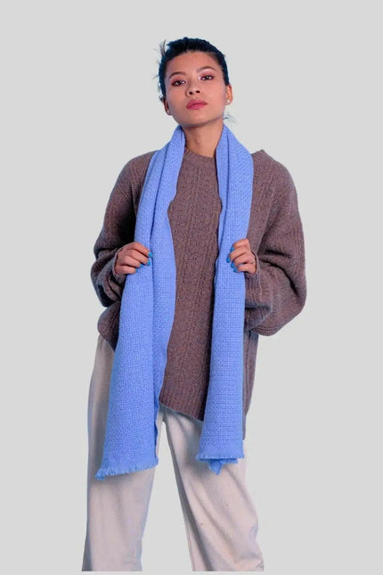 Italian Cashmere Basket Weave Scarf on a woman in blue scarf and brown sweater