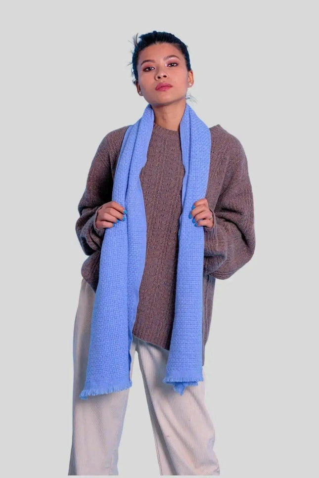 Italian Cashmere Basket Weave Scarf on a woman in blue scarf and brown sweater