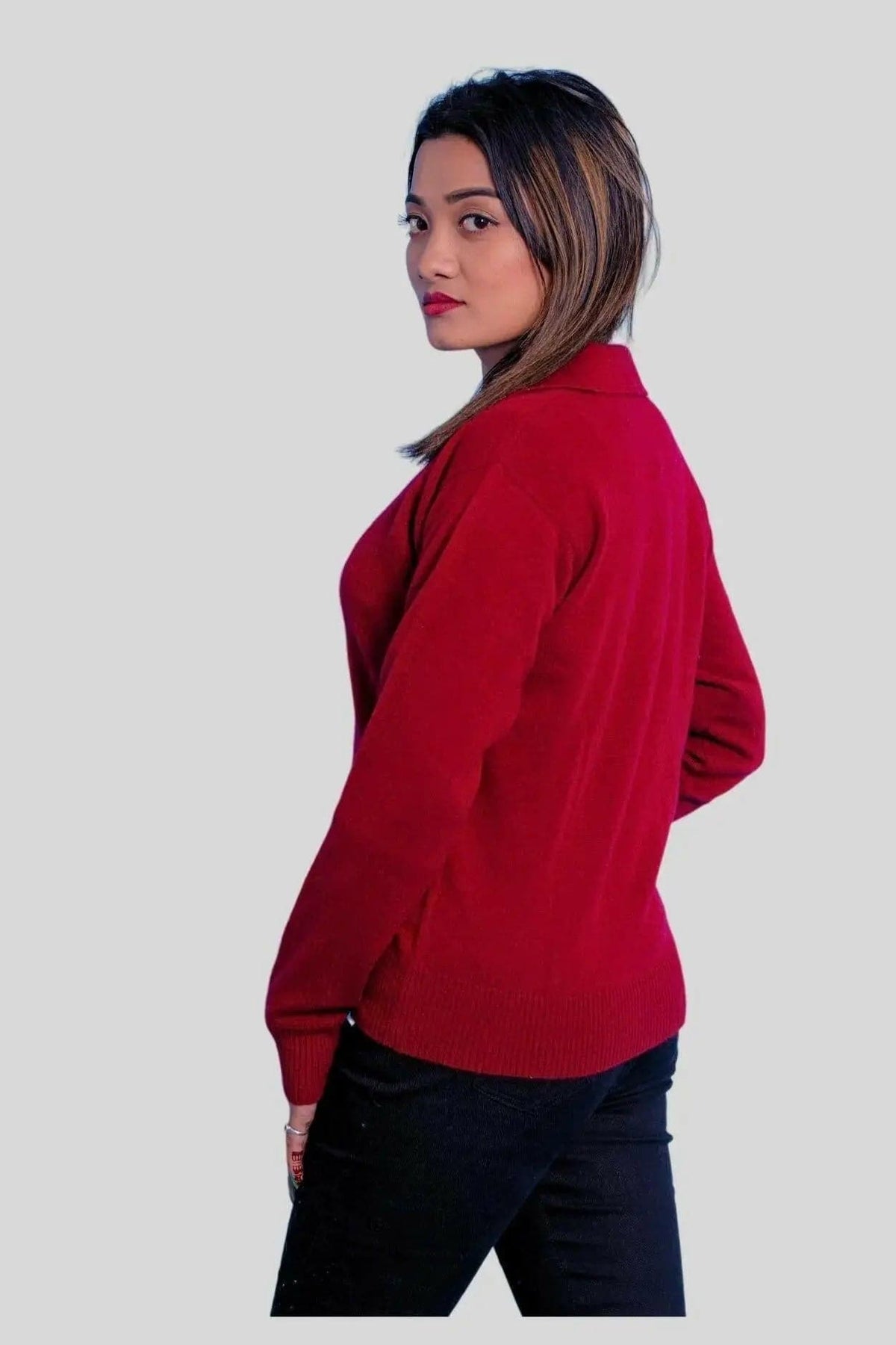 Woman in red cashmere polo and black pants - Italian Cashmere Polo | Luxe Comfort & Style