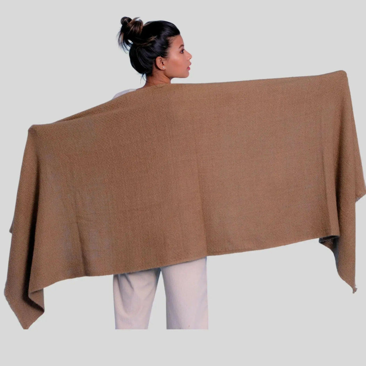 Italian Cashmere Scarf for Luxurious Winter Warmth: Woman wearing brown shawl