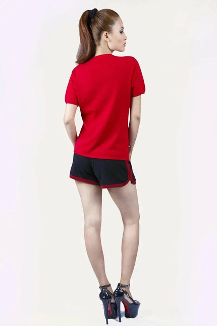 Italian Cashmere Turtle Neck T-Shirt with a flattering turtle neck worn by a woman in red shirt and black shorts