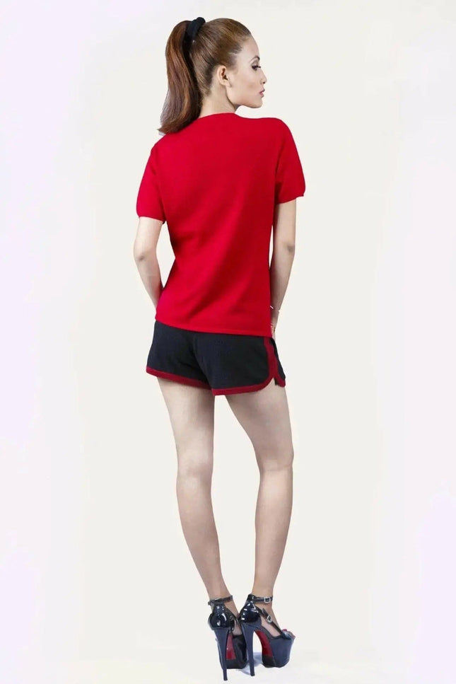 Italian Cashmere Turtle Neck T-Shirt with a flattering turtle neck worn by a woman in red shirt and black shorts