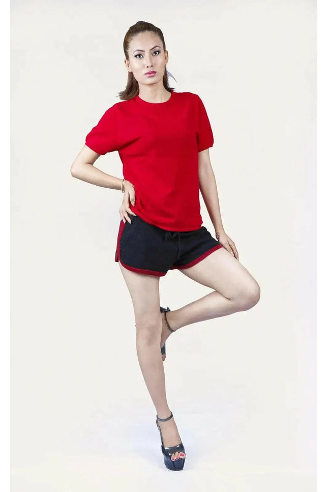Italian Cashmere Turtle Neck T-Shirt featuring a woman in red shirt and black shorts