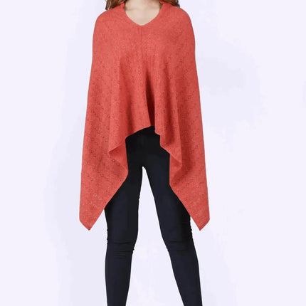 KCI 120 cashmere poncho outfit with black pants and heels