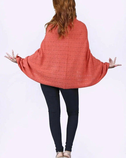 KCI 120 cashmere poncho by Kanchan Cashmere on woman with arms outstretched