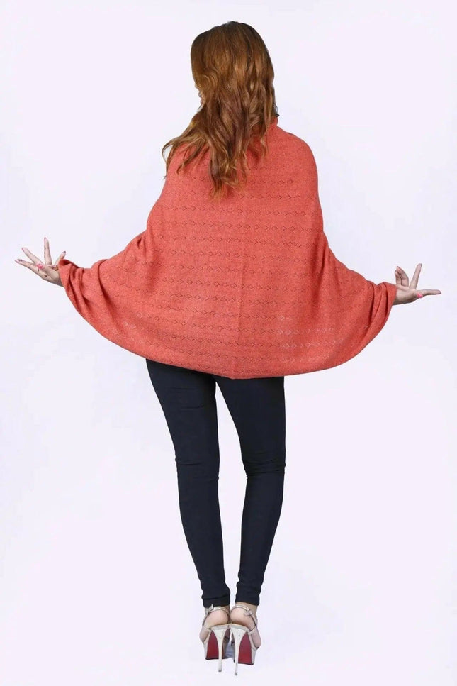 KCI 120 cashmere poncho by Kanchan Cashmere on woman with arms outstretched