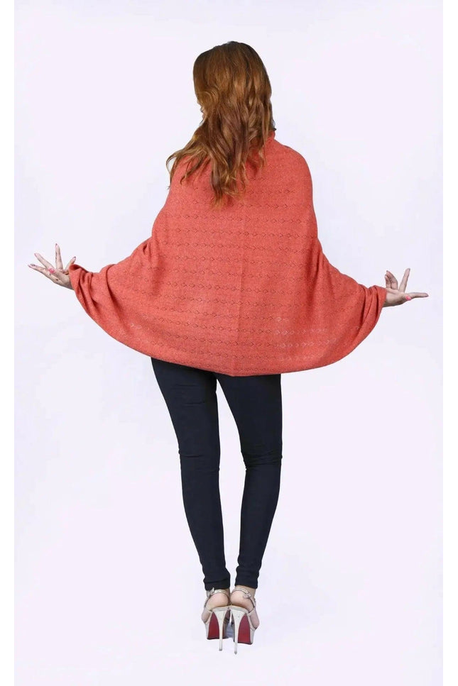 KCI 120 cashmere poncho by Kanchan Cashmere on woman with arms outstretched
