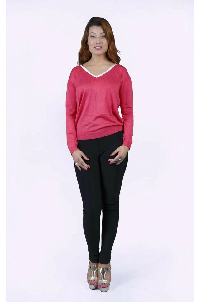 College knit KCI 135 in deep rose: woman in pink sweater and black pants