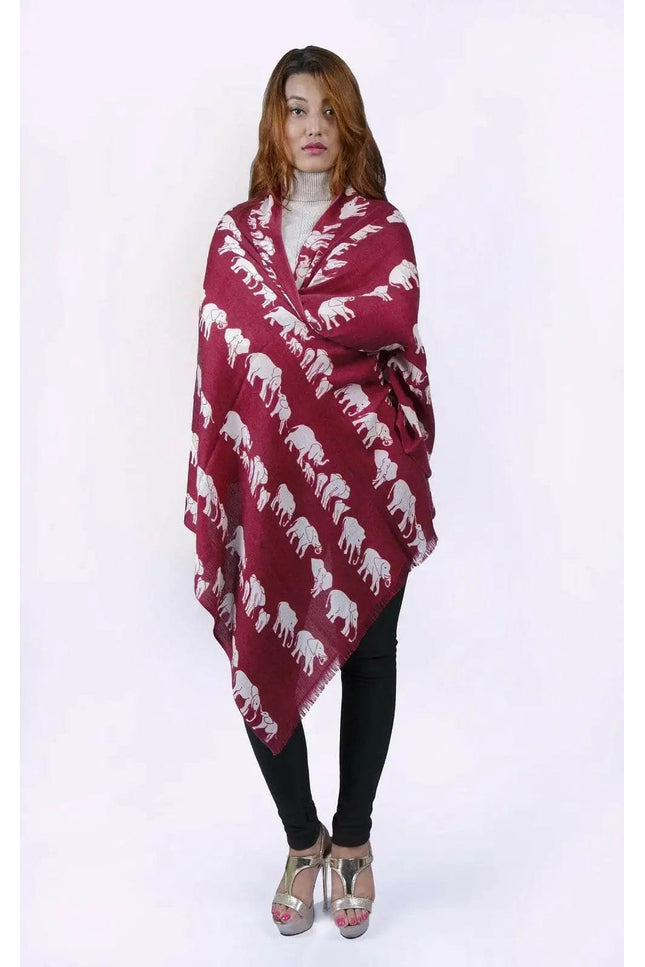 Woman wearing red and white cashmere animal printed ponche named ’KCI 202’