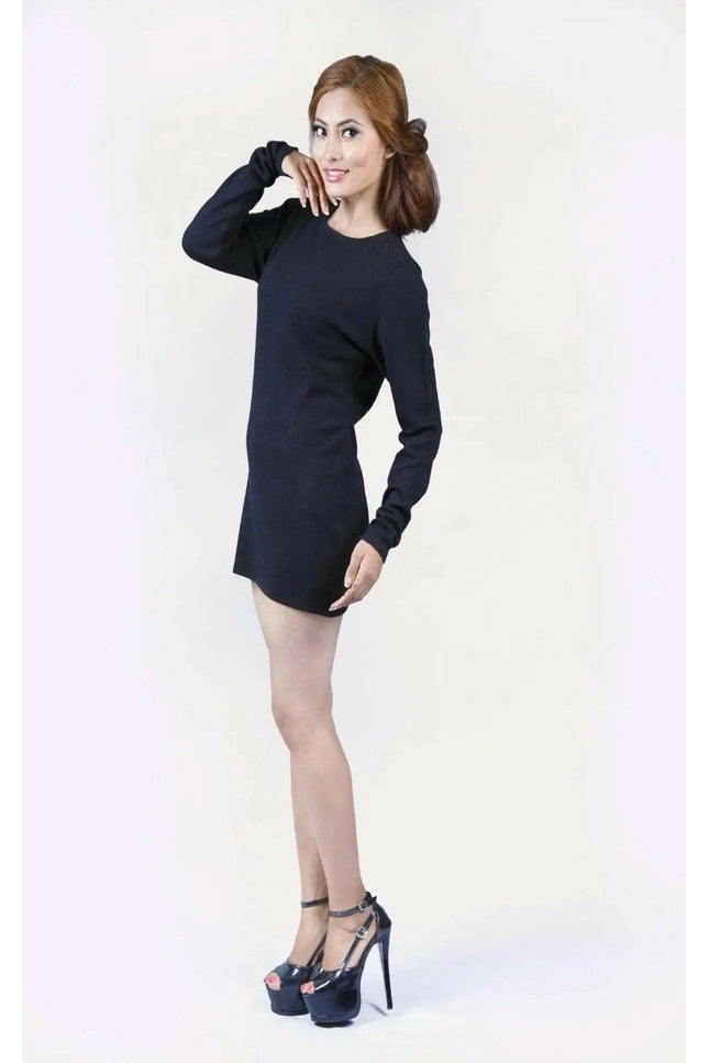 KCI 221: Woman in black dress, ultimate wardrobe essential pose for picture