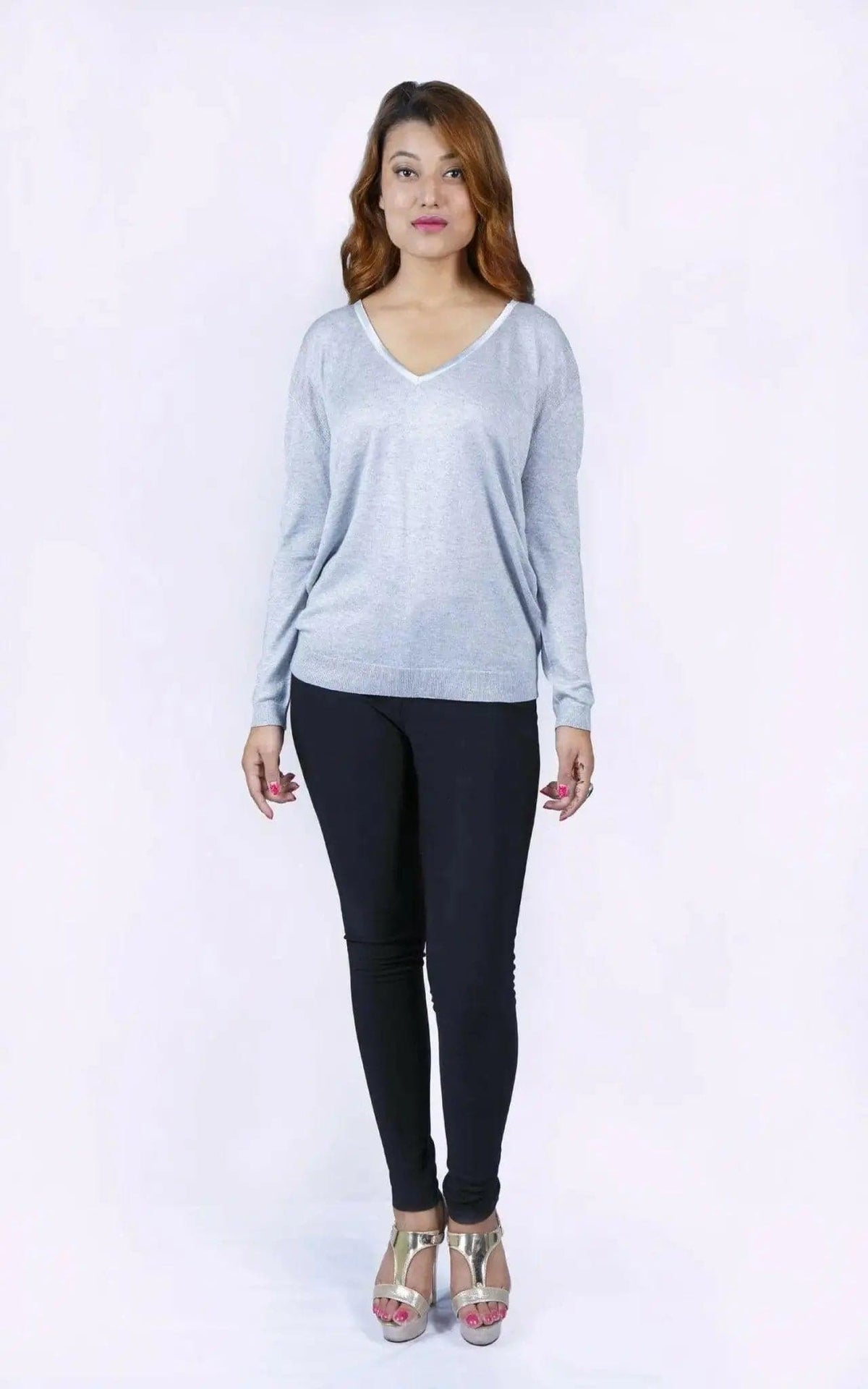 Woman in grey cropped sleeve jumper and black pants - KCI 226