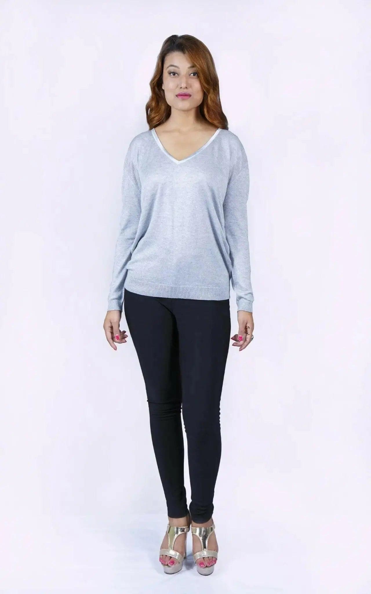 Woman in grey cropped sleeve jumper and black pants - KCI 226
