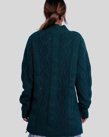 Woman in green cashmere cable dress
