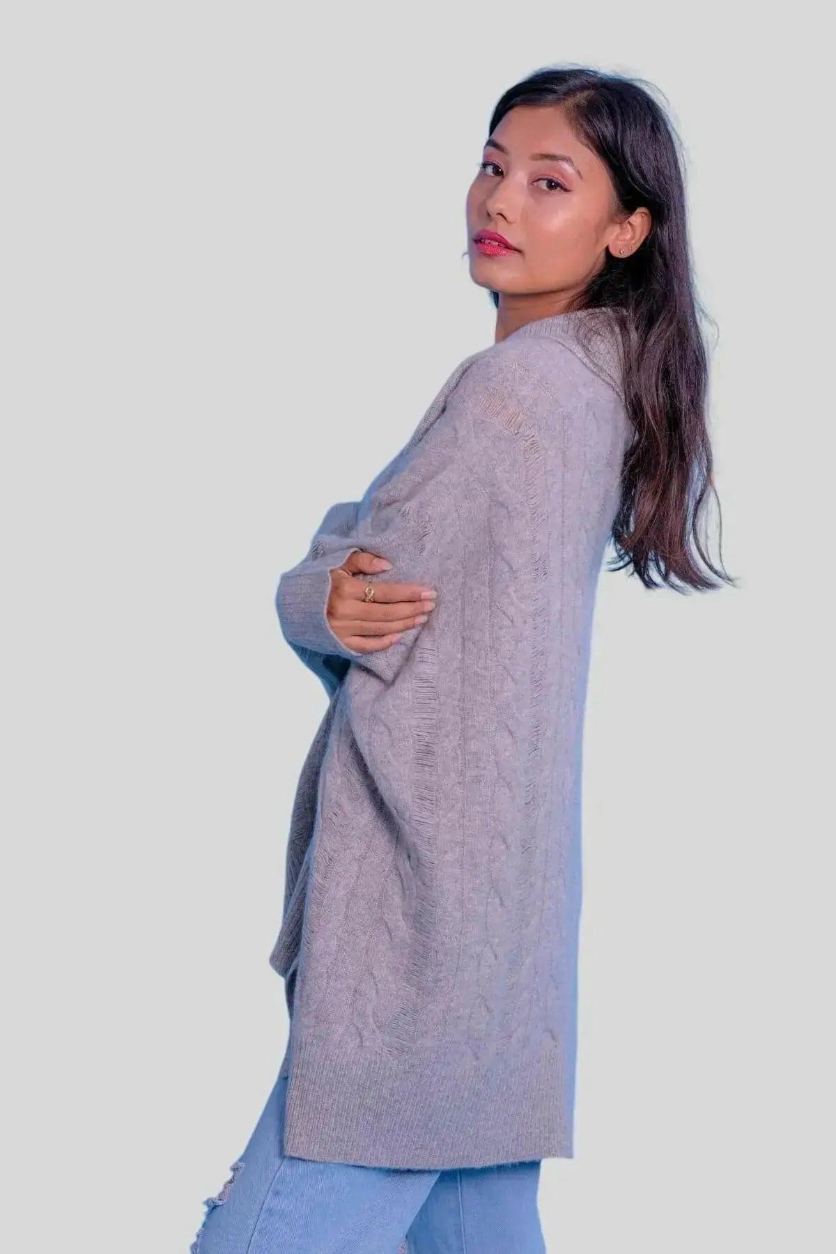 Luxurious Cashmere Oversized Cable Pullover featuring woman in grey sweater and jeans