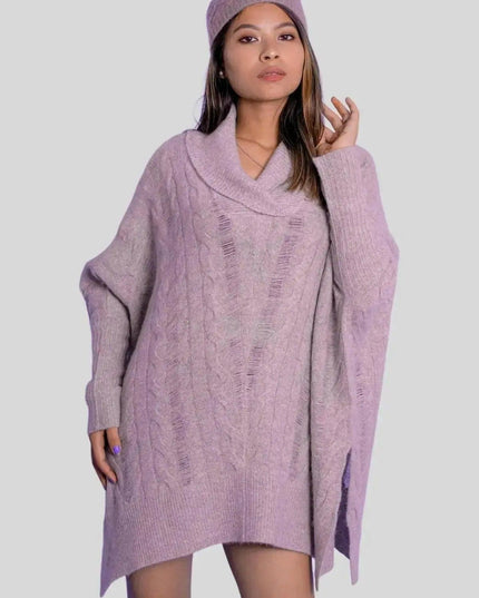 Woman in purple cashmere oversized cable pullover and hat