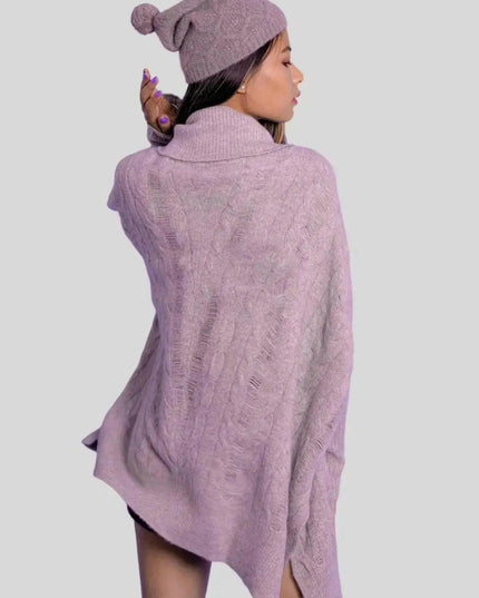 Woman in purple cashmere cable pullover and hat