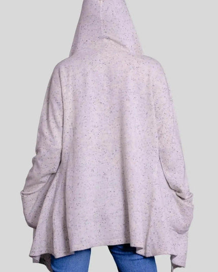 Woman in luxurious cashmere hooded wrap