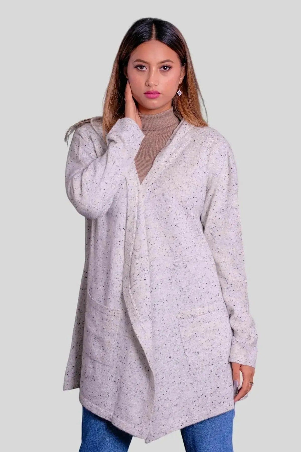 Woman wearing grey sweater and jeans in Luxurious Cashmere Hooded Wrap