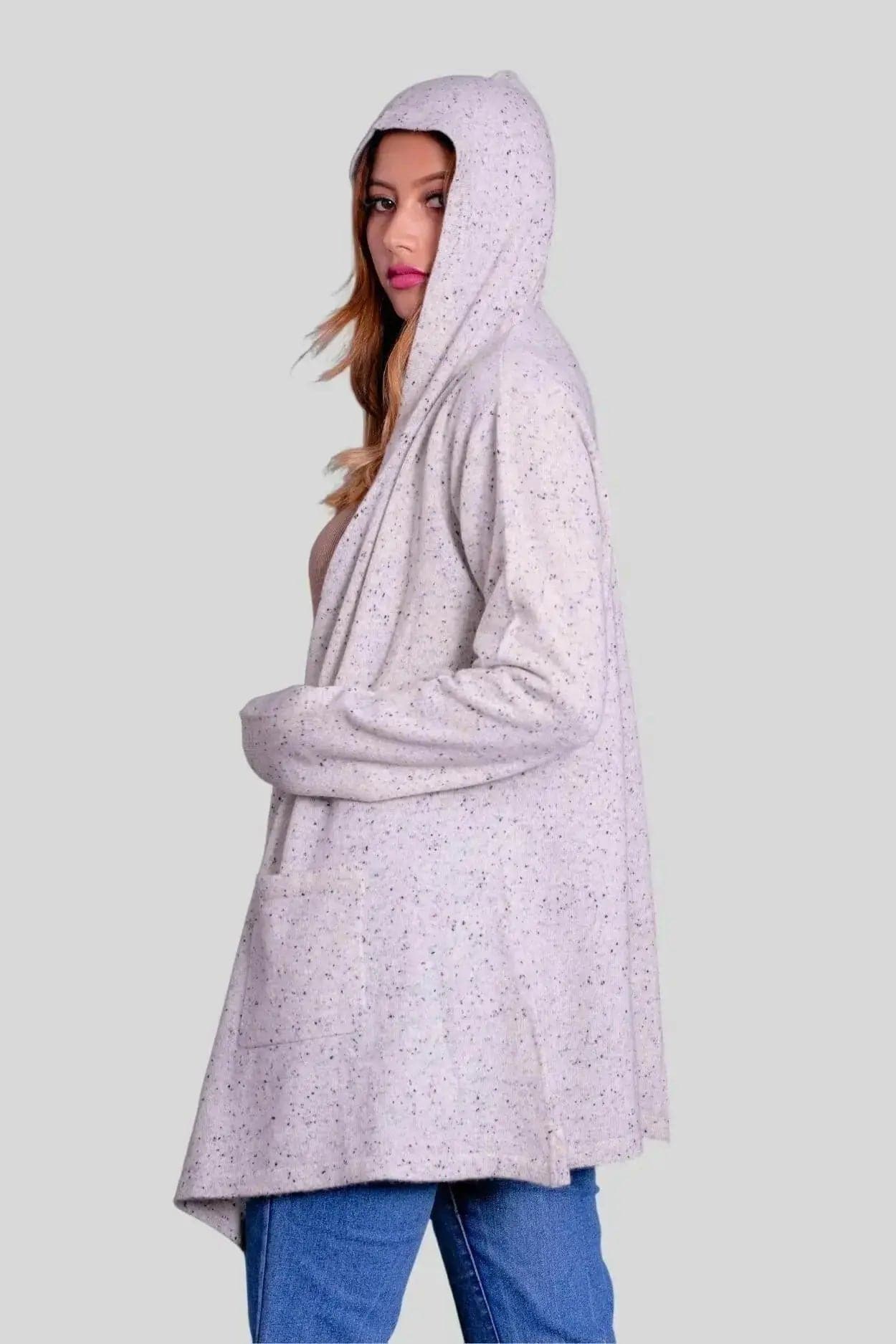 Woman wearing white hooded cashmere wrap coat