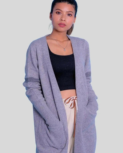 Woman wearing a grey cashmere open long cardigan sweater