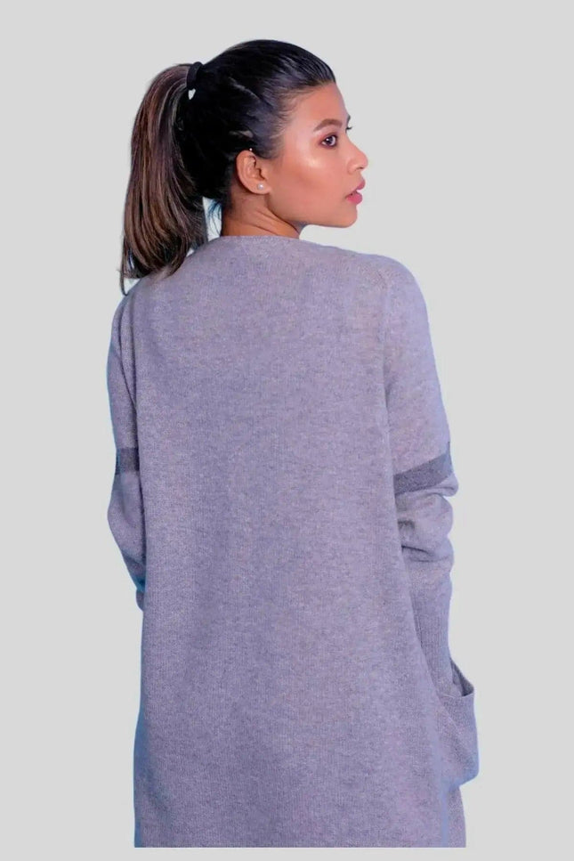 Grey cashmere open long cardigan worn by woman with ponytail