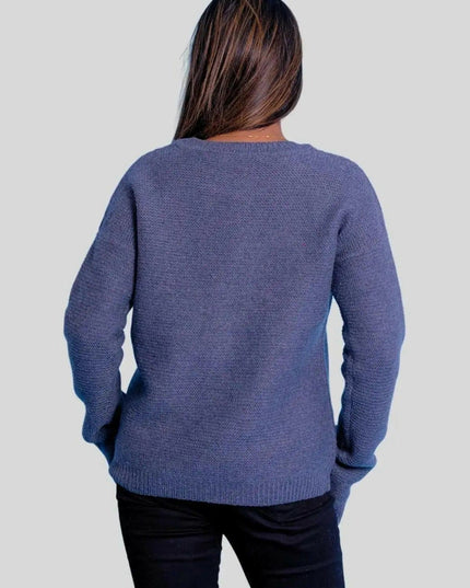 Luxurious cashmere ribbed pullover on woman in blue sweater