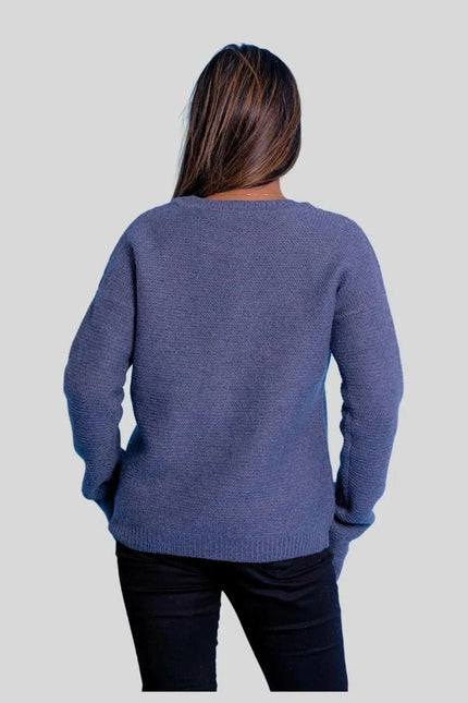 Luxurious cashmere ribbed pullover on woman in blue sweater