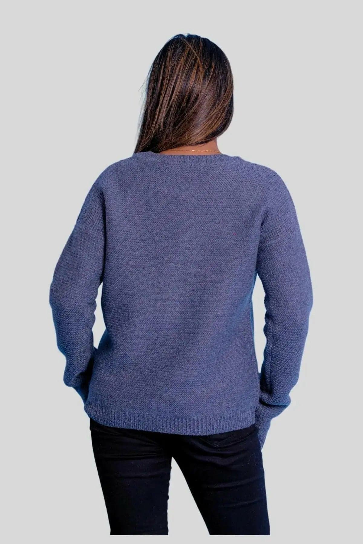 Luxurious cashmere ribbed pullover on woman in blue sweater