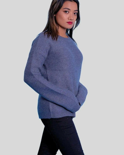 Luxurious Cashmere Ribbed Pullover featuring a woman in a blue sweater and black jeans
