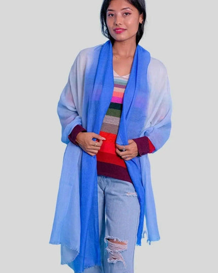 Woman in a luxurious cashmere shaded scarf