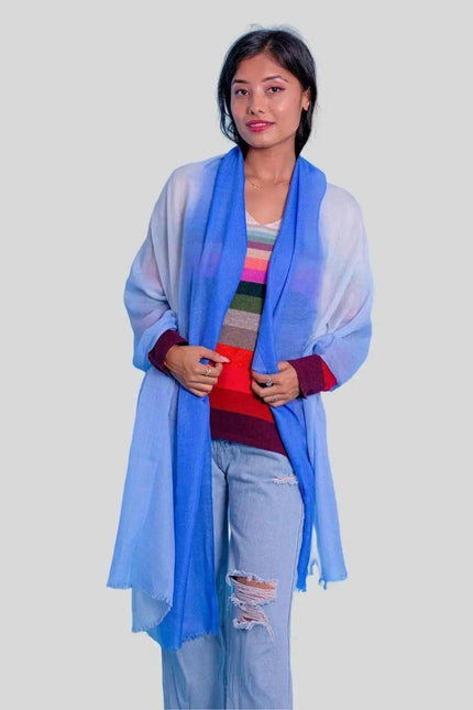 Woman in a luxurious cashmere shaded scarf
