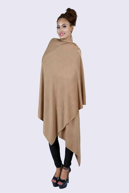 Luxurious Cashmere Shawl in Tan Poncho Style worn by woman in black leggings