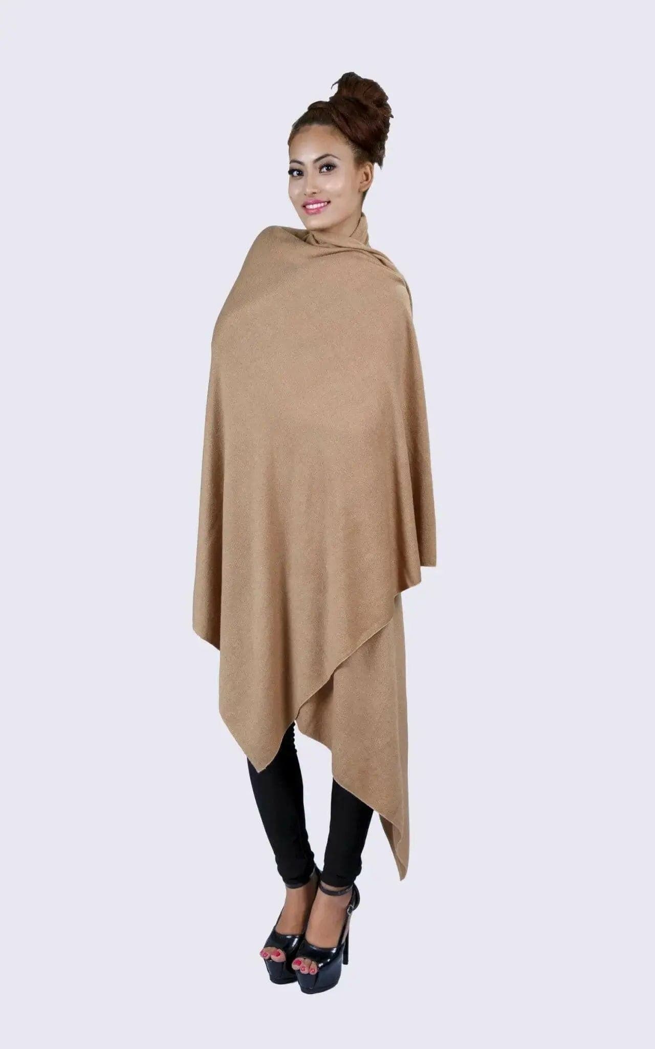 Luxurious Cashmere Shawl in Tan Poncho Style worn by woman in black leggings