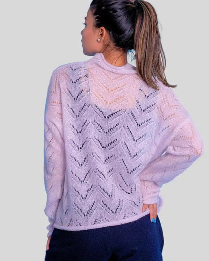 Luxurious cashmere silk pointelle pullover on woman in pink sweater