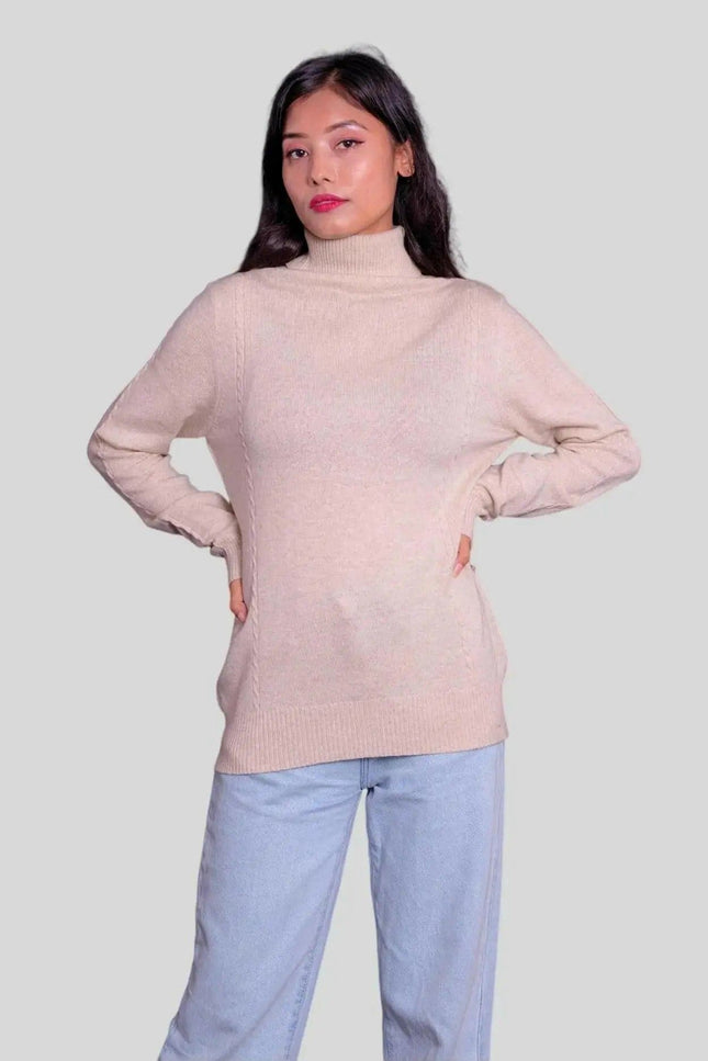 Woman wearing pink cashmere turtleneck pullover and blue jeans