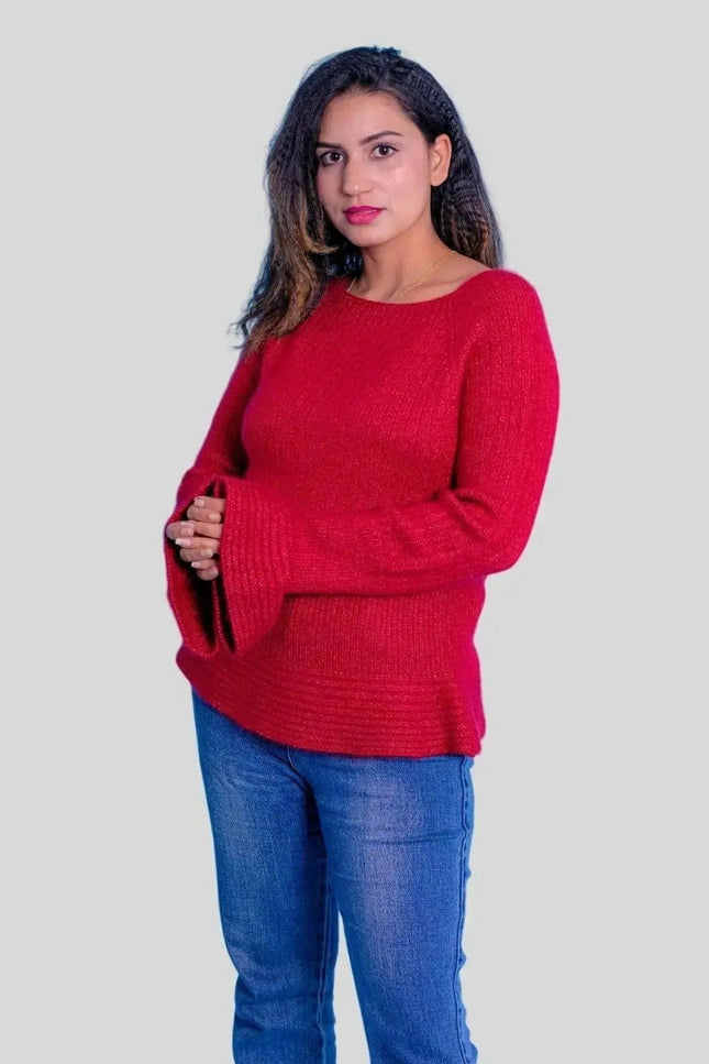 Woman in red sweater and jeans wearing Luxurious Cashmere Wider Cuff Pullover
