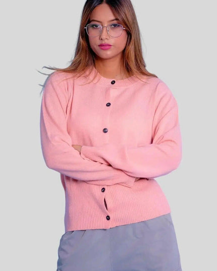 Woman wearing pink cashmere button cardigan