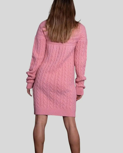 Woman wearing a pink cashmere cable dress by Luxurious Italian Cashmere