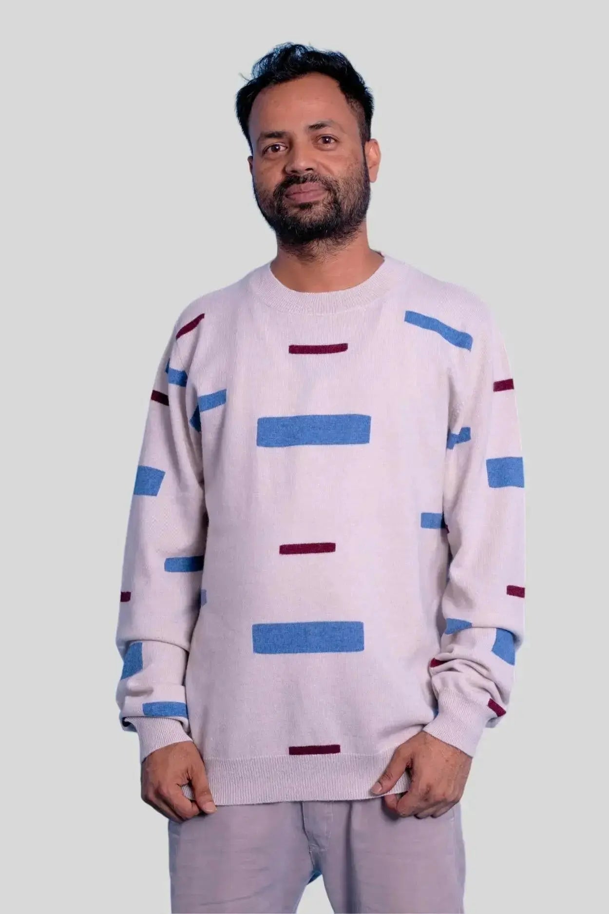 Man in pink Italian Cashmere Crew Neck Sweater with stripes