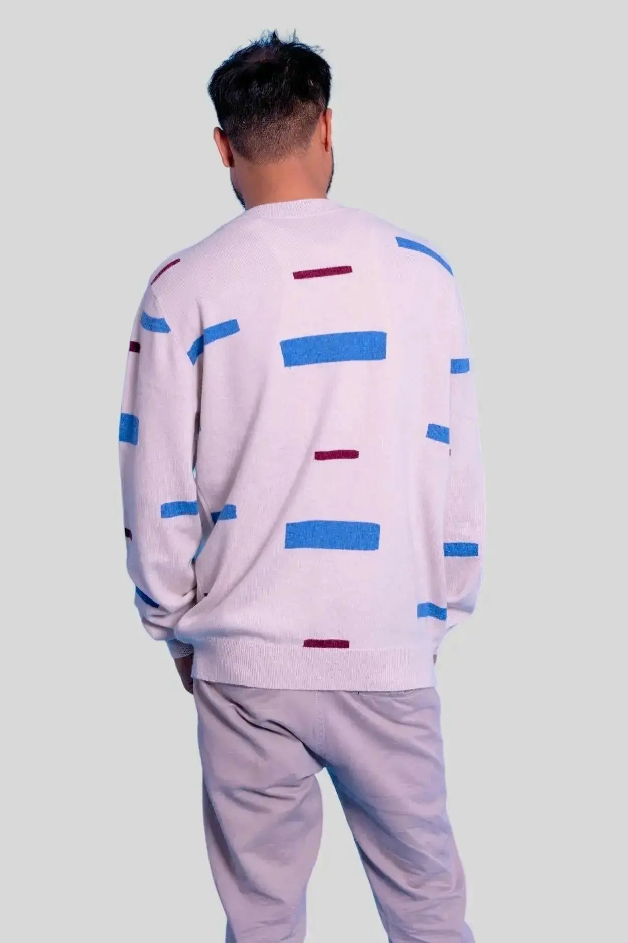 Luxurious Italian Cashmere mens crew neck sweater in pink and blue outfit