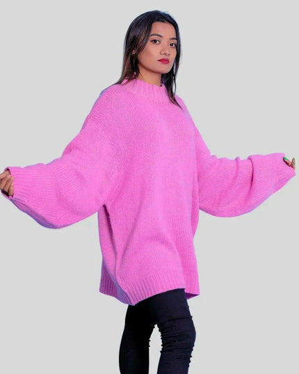 Woman in pink sweater and black jeans wearing Luxurious Italian Cashmere Crew Neck Sweater