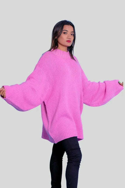 Woman in pink sweater and black jeans wearing Luxurious Italian Cashmere Crew Neck Sweater