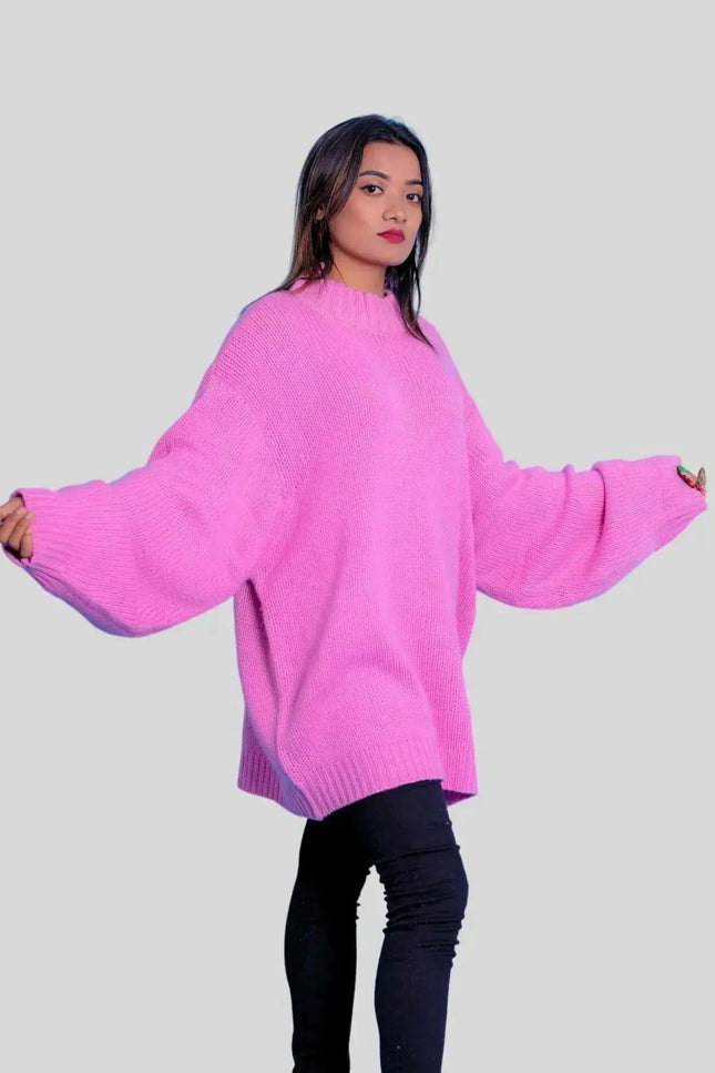 Woman in pink sweater and black jeans wearing Luxurious Italian Cashmere Crew Neck Sweater