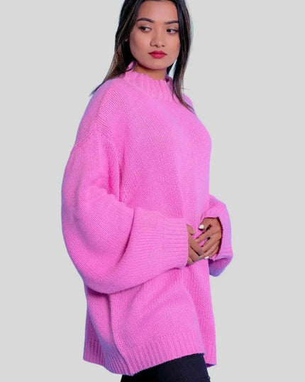 Woman in pink sweater and black jeans modeling Luxurious Italian Cashmere Crew Neck Sweater