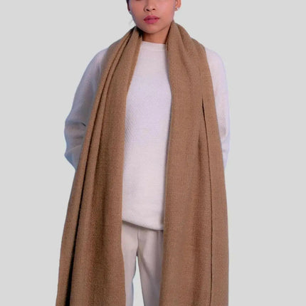 Woman wearing tan cashmere handspun scarf and white pants - Luxurious Italian Cashmere Handspun Scarf